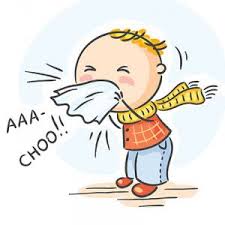 a boy sneezing